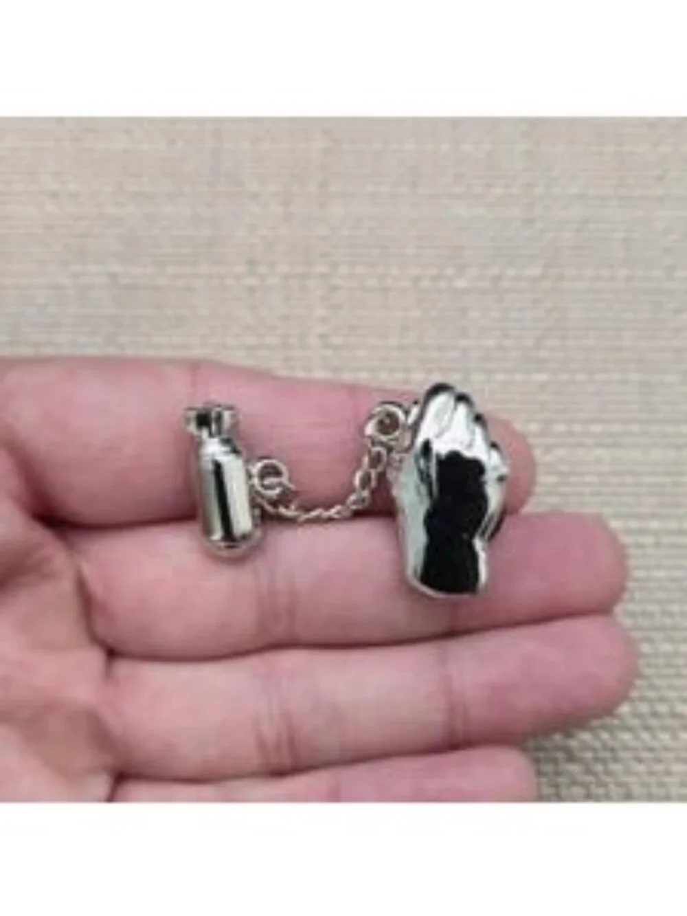 Hand And Bomb Hat Club Pin A8387